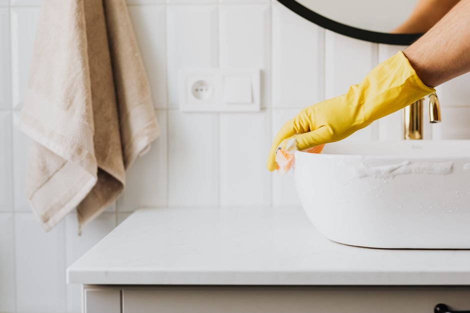 Thoroughly cleaning a bathroom sink and mirror